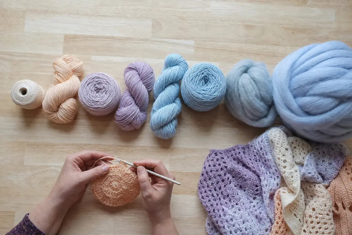 Eight yarns arranged from fine thread to jumbo roving